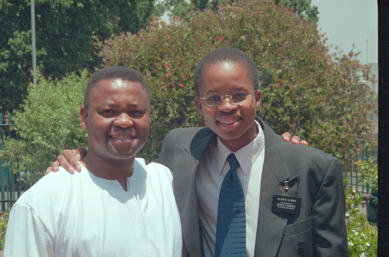 Elder Kozwa and baptismal candidate