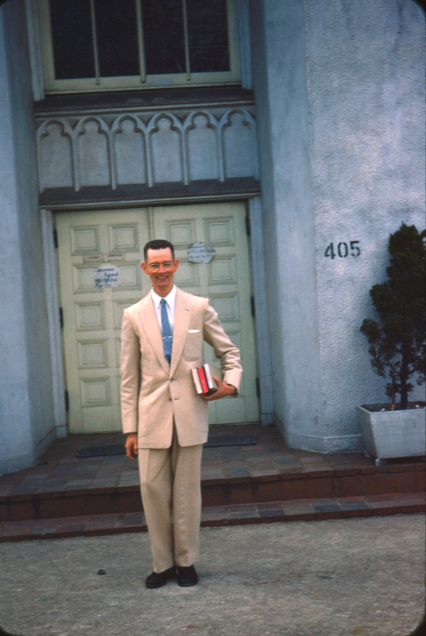 Larry Colton, pinky orange suit tailor made in Hong Kong