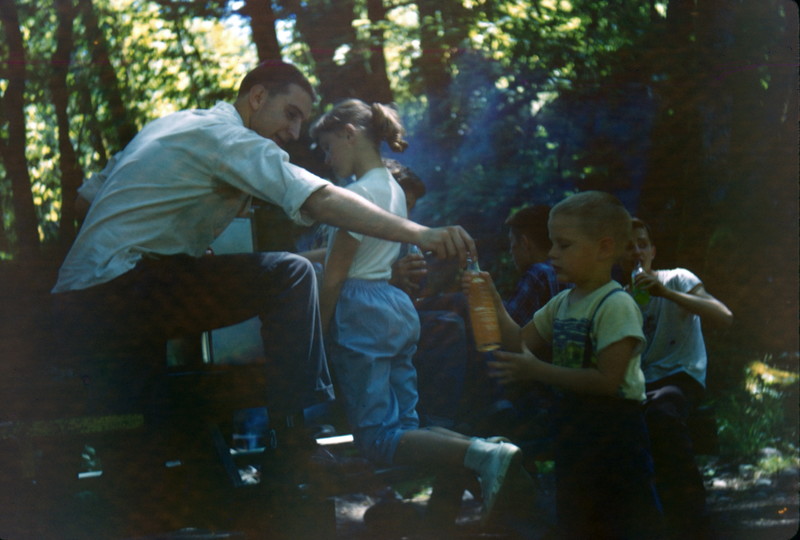 Don receiving bottle, Seward Point?, Mercer Island, Lake Washington, ward picnic