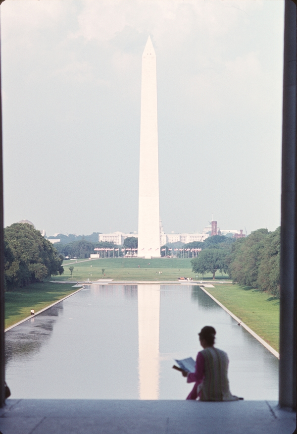 Washington Monument, taken from Lincoln Memorial, Jean reading, about 1960