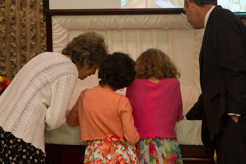 Maryjo, Becca, Evee, Steve. Casket.